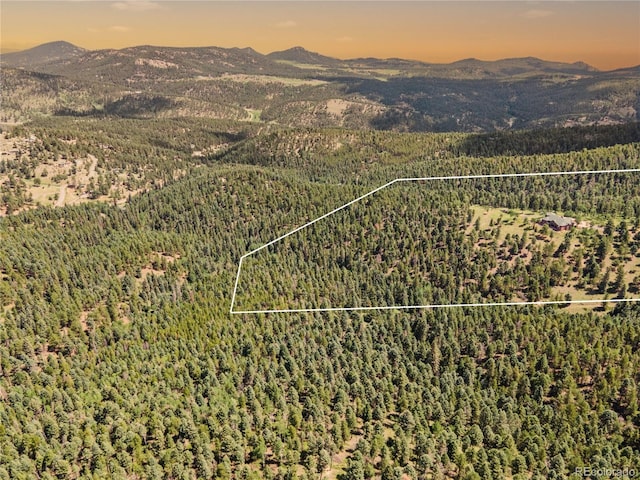 aerial view at dusk with a mountain view