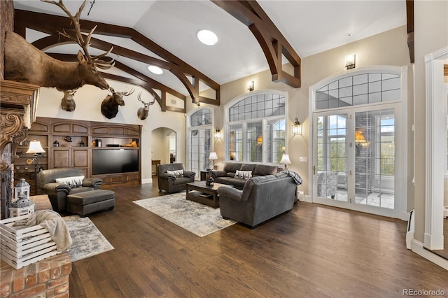 living room with high vaulted ceiling, dark wood-type flooring, french doors, and beamed ceiling