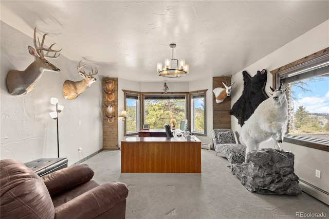 office area with baseboard heating, light colored carpet, and a notable chandelier