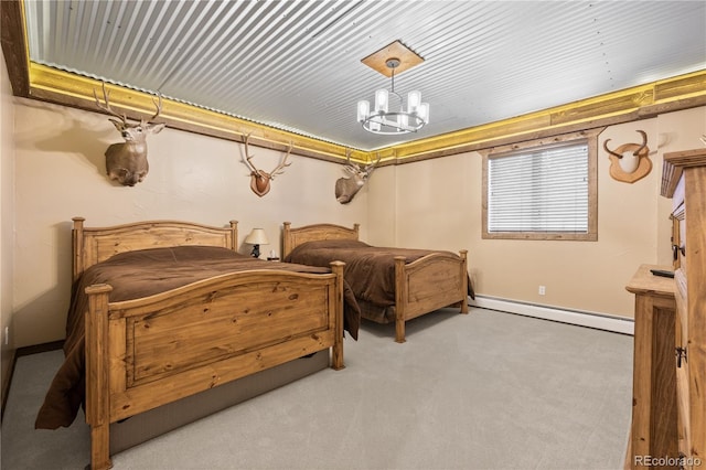 carpeted bedroom with a baseboard heating unit and an inviting chandelier