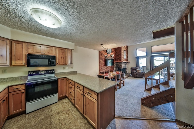 56 Gcr 834 Unit 2F, Fraser, CO 80442 - kitchen featuring range with electric stovetop, black microwave, a stone fireplace, a peninsula, and a textured ceiling