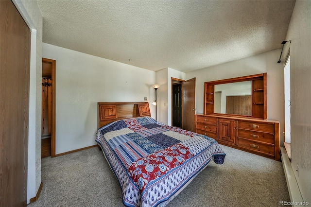 56 Gcr 834 Unit 2F, Fraser, CO 80442 - carpeted bedroom featuring a textured ceiling and baseboards