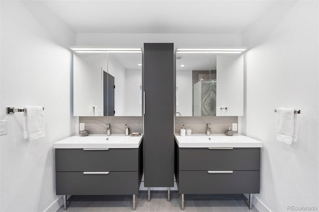 bathroom with vanity and an enclosed shower