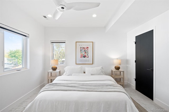 carpeted bedroom with ceiling fan