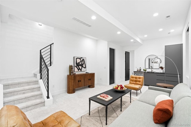 living room featuring sink