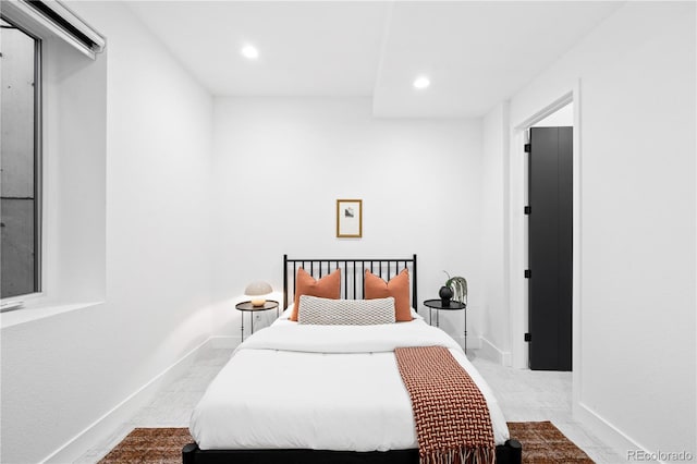 bedroom featuring light colored carpet