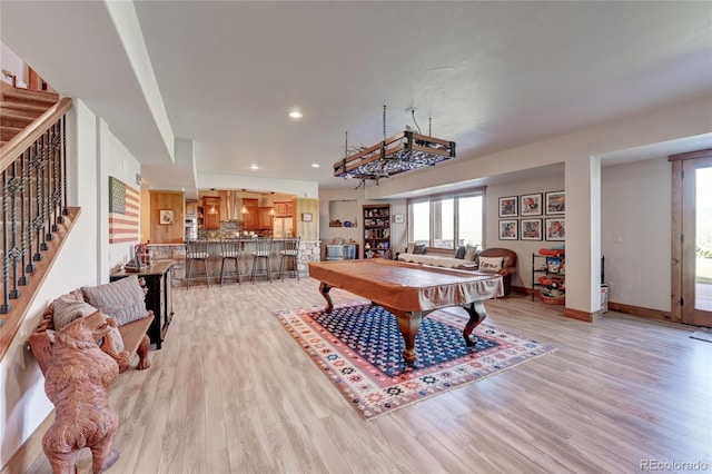 game room featuring pool table and light hardwood / wood-style floors