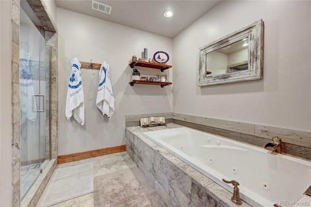 bathroom featuring separate shower and tub