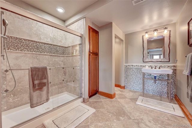 bathroom with vanity and walk in shower