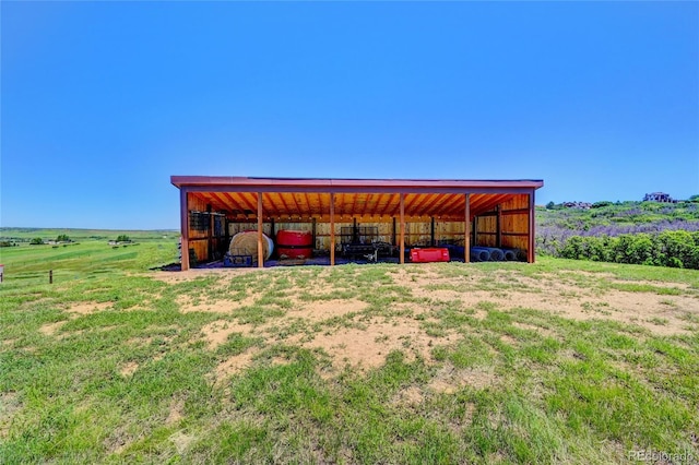 view of outdoor structure featuring a rural view