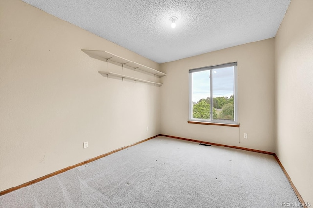 13008 Grove Way, Broomfield, CO 80020 - unfurnished room with carpet flooring, baseboards, and a textured ceiling