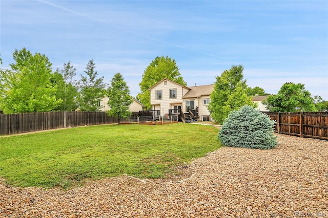 13008 Grove Way, Broomfield, CO 80020 - view of yard featuring a deck