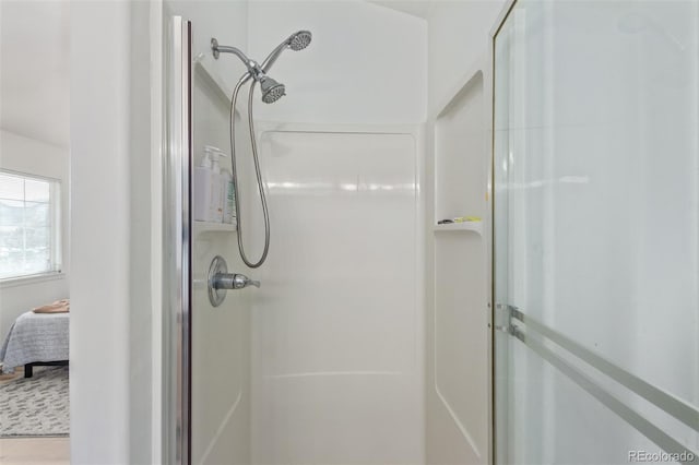 bathroom featuring walk in shower