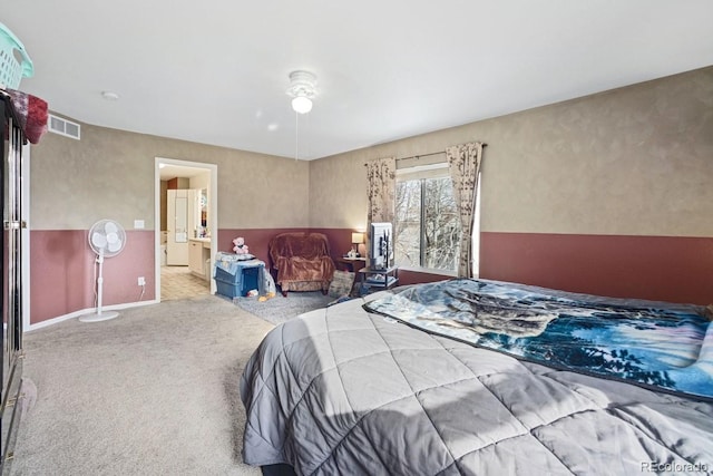 bedroom featuring light colored carpet