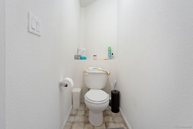 bathroom featuring toilet