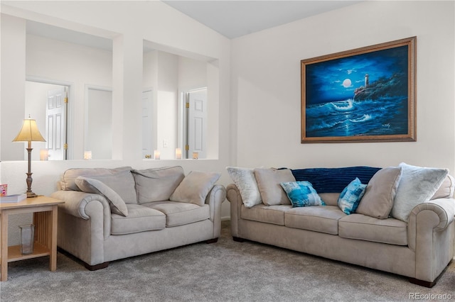 living area with carpet