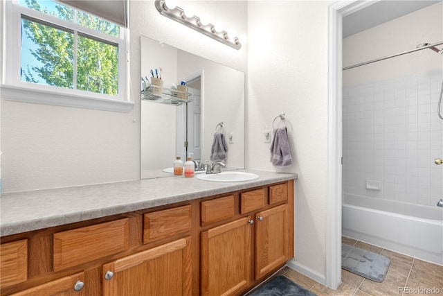 bathroom with vanity, tile patterned floors, and bathtub / shower combination