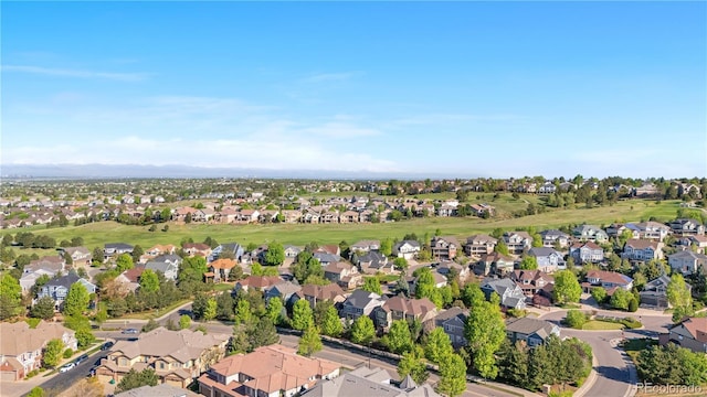 aerial perspective of suburban area featuring a golf club