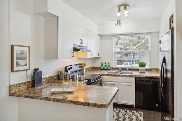 kitchen featuring sink, white cabinetry, dark stone countertops, black appliances, and kitchen peninsula