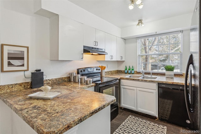 kitchen featuring sink, white cabinetry, dark stone countertops, black appliances, and kitchen peninsula