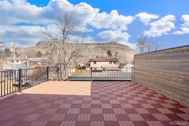 view of patio / terrace featuring a mountain view