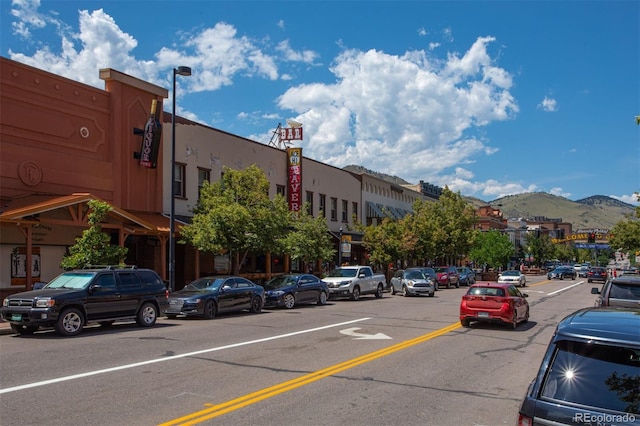 view of building exterior featuring a mountain view