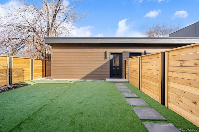 exterior space featuring a fenced backyard