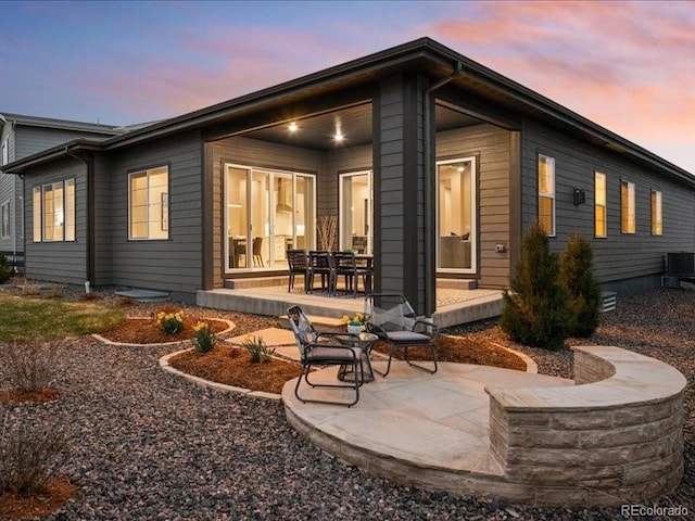 rear view of house with a patio