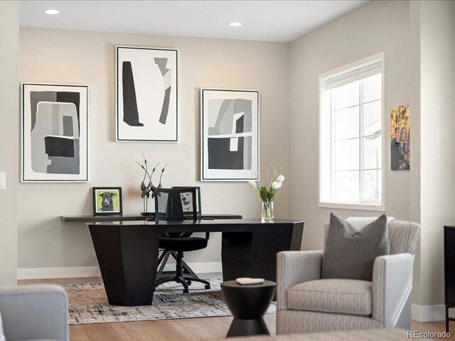 office space featuring recessed lighting, baseboards, and wood finished floors
