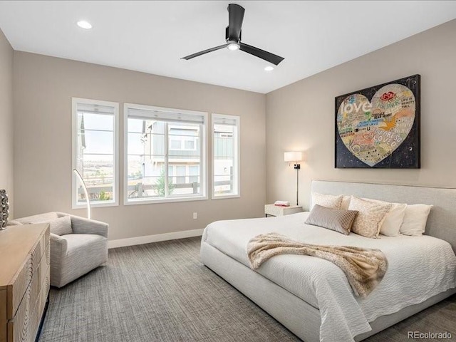 carpeted bedroom featuring baseboards, recessed lighting, and a ceiling fan