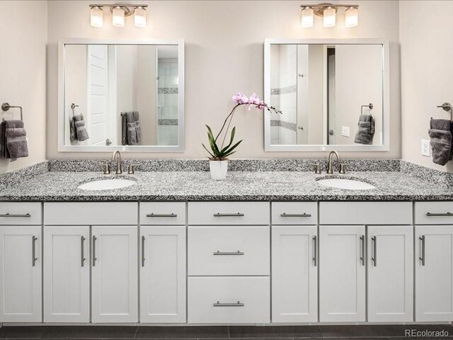 6530 Barnstead Dr, Castle Pines, CO 80108 - bathroom featuring double vanity