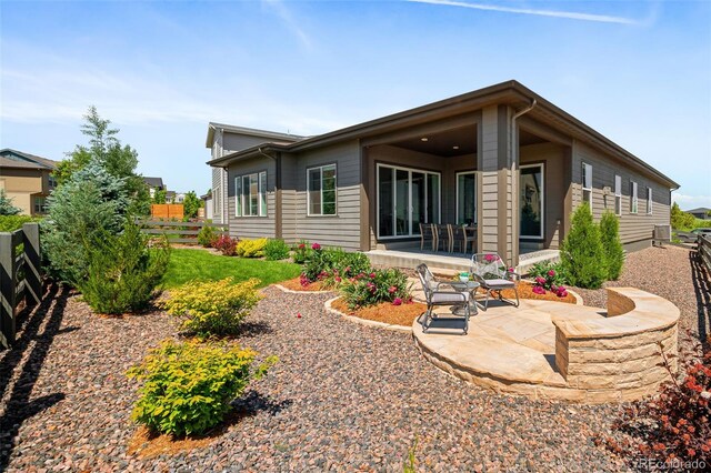 6530 Barnstead Dr, Castle Pines, CO 80108 - rear view of house featuring a patio