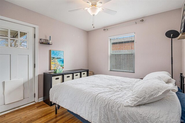 3640 N Saint Paul St, Denver, CO 80205 - bedroom with wood finished floors and ceiling fan
