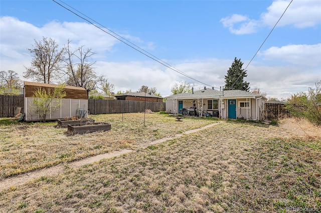 3640 N Saint Paul St, Denver, CO 80205 - fenced backyard with a storage shed