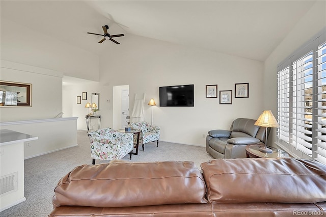 carpeted living area featuring high vaulted ceiling, visible vents, ceiling fan, and baseboards