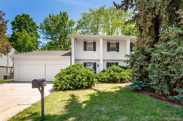 9540 E Grand Pl, Greenwood Village, CO 80111 - neoclassical home featuring a garage, driveway, and a front yard