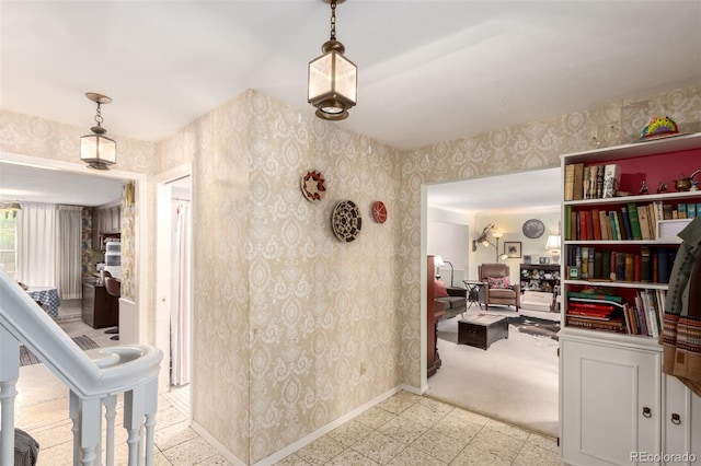 9540 E Grand Pl, Greenwood Village, CO 80111 - hall featuring wallpapered walls and baseboards