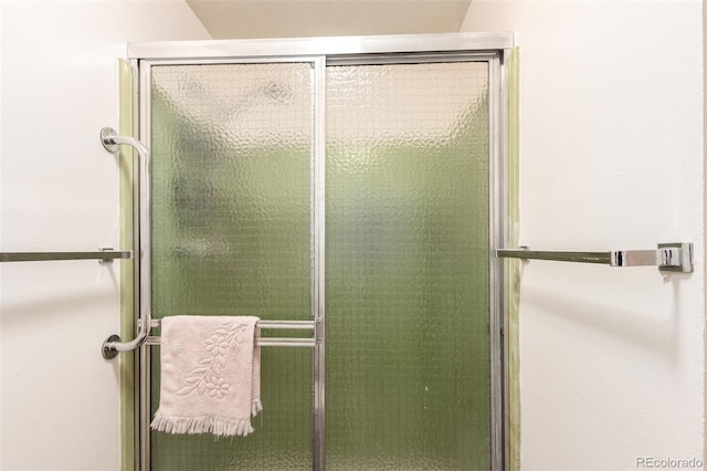 9540 E Grand Pl, Greenwood Village, CO 80111 - full bathroom featuring a shower with door