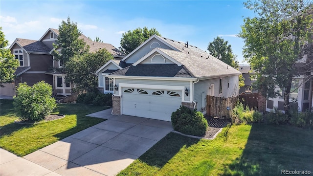15926 Butterwort Cir, Parker, CO 80134 - view of front of house with driveway, roof with shingles, and a garage