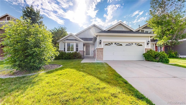 15926 Butterwort Cir, Parker, CO 80134 - view of front of property featuring a front lawn, concrete driveway, a garage, and brick siding