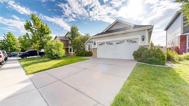 15926 Butterwort Cir, Parker, CO 80134 - view of front of house featuring a front lawn, concrete driveway, and brick siding