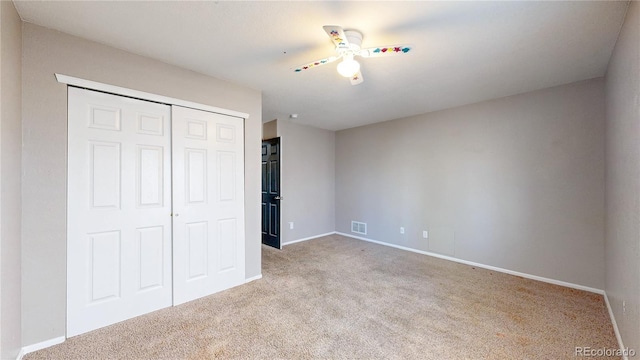 15926 Butterwort Cir, Parker, CO 80134 - unfurnished bedroom with carpet flooring, a closet, and ceiling fan