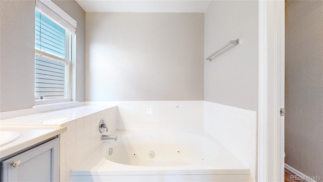 15926 Butterwort Cir, Parker, CO 80134 - full bath featuring a whirlpool tub and vanity