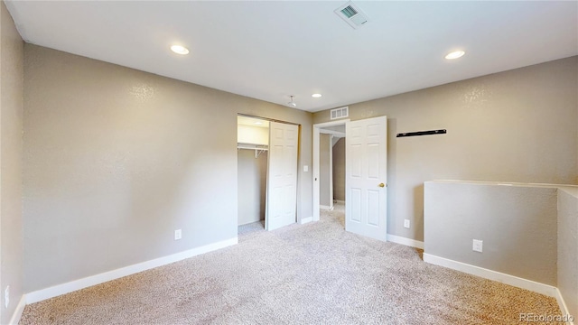 15926 Butterwort Cir, Parker, CO 80134 - unfurnished bedroom featuring light carpet, recessed lighting, and a closet