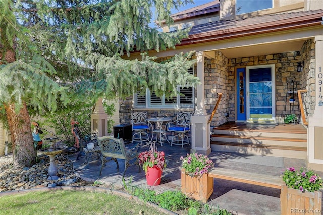 exterior space featuring stone siding