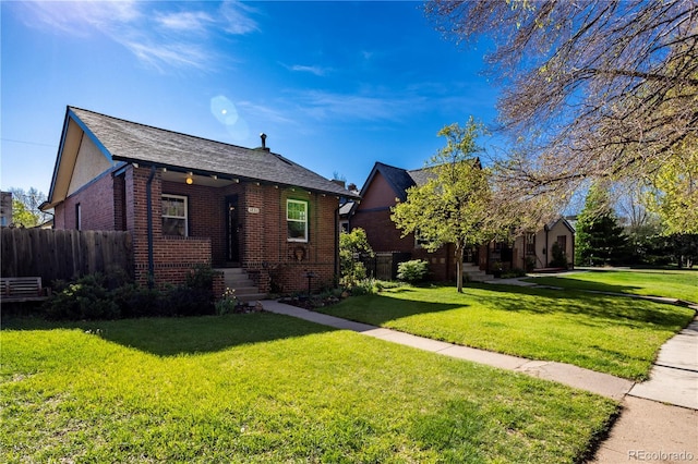 view of front of home featuring brick siding