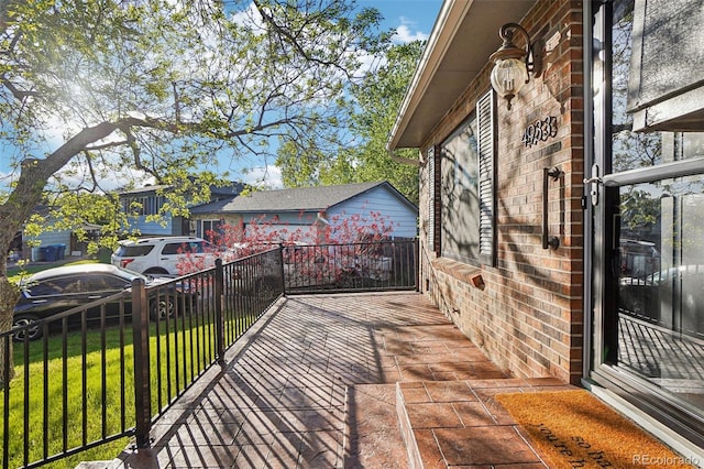 wooden deck with a yard