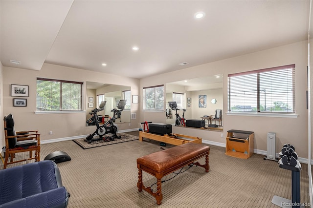 exercise area with carpet, baseboards, and recessed lighting