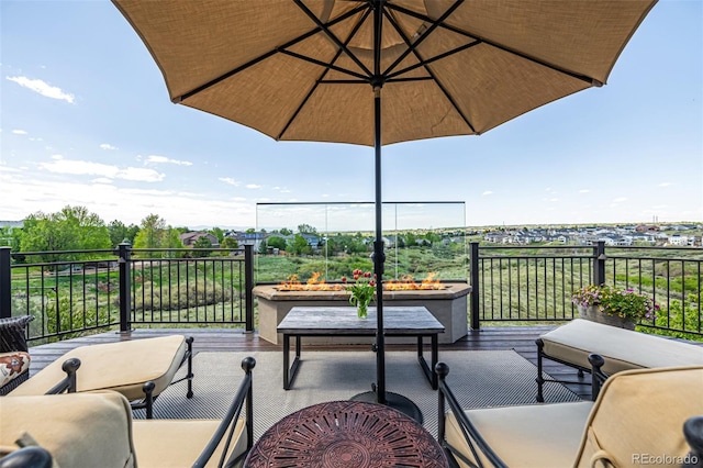 balcony featuring a fire pit