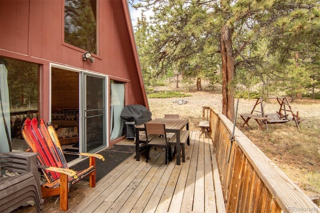 244 Lariat Loop, Hartsel, CO 80449 - deck with outdoor dining space and a grill
